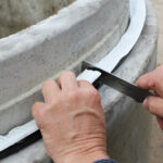 Pro-Stik installation on a concrete pipe.