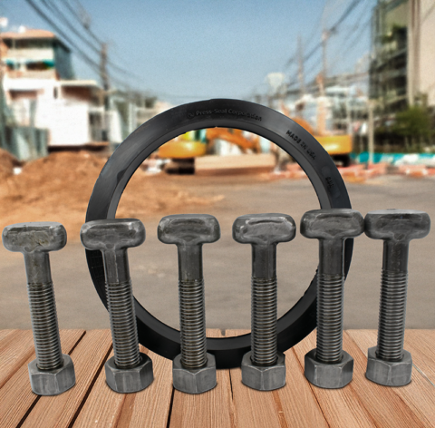 Small group of bolts standing straight up in front of a round rubber gasket